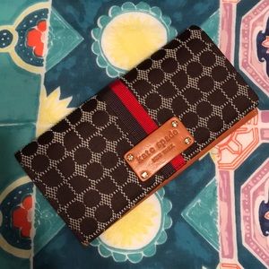 Kate spade fold over wallet in brown pattern